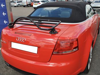 Red audi a4 rs4 convertible with a revo-rack black luggage rack fitted