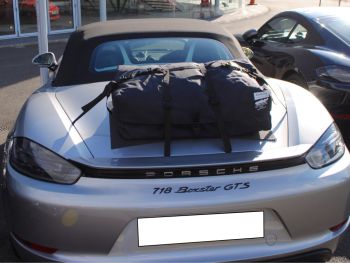 silver porsche boxster 718 gts with a bootbag luggage rack fitted 