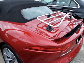 Burgundy Jaguar f type convertible with a revo-rack pa luggage rack fitted and the spoiler up showing it does not hit the luggage rack