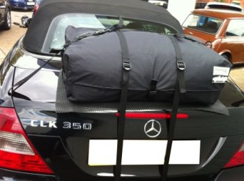 black mercedes benz clk convertible with a bootbag original luggage rack fitted