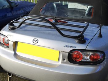 silver mazda mx5 miata nc mk3 with a revo-rack black luggage rack attached to the trunk/boot