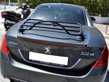 dark grey peugeot 308cc with a boot rack fitted