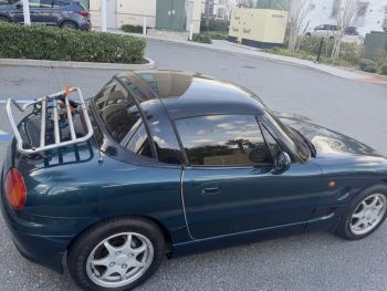 dark green suzuki cappuccino with a revo-rack pa chrome stainless steel luggage rack fitted 