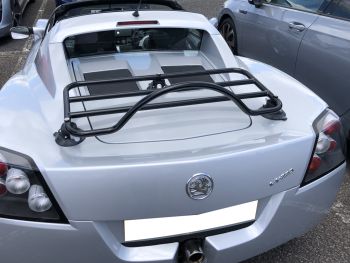 silver vauxhall VX 220 with a Revo-Rack luggage Rack fitted photographed close form the rear