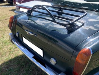 green rolls royce corniche at a car show with a revo-rack luggage rack fitted