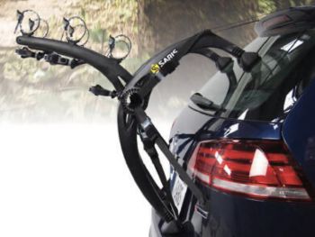 blue vw gold hatch with a 3 bike rack fitted 