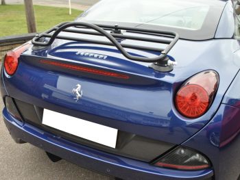 Blue ferrari California convertible with a black revo-rack luggage rack fitted