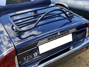 Blue jaguar xjs with a luggage rack fitted