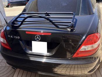 Mercedes SLK R171 350 in black with a black luggage rack fitted photographed from the rear