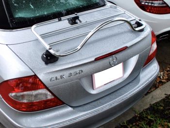 silver mercedes clk convertible with a stainless steel luggage rack fitted photographed from above
