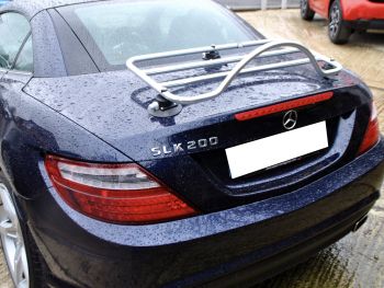 Blue mercedes slk r172 200 with a revo-rack pa luggage rack fitted photographed close from the rear in the rain