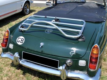 Green mgb at a car show photographed from the rear on a sunny day with a revo-rack pa luggage rack fitted