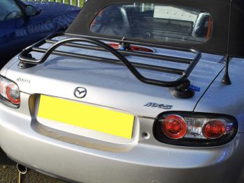 silver mazda mx5 miata nc mk3 with a revo-rack black luggage rack attached to the trunk/boot