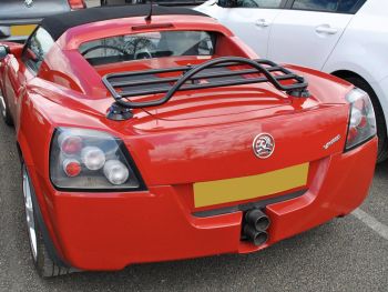 Red Vauxhall VX220 with a black revo rack luggage rack attached